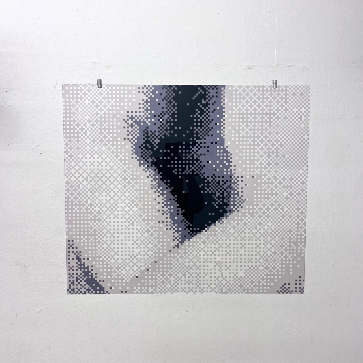Pixelated monochrome close-up of a nude body